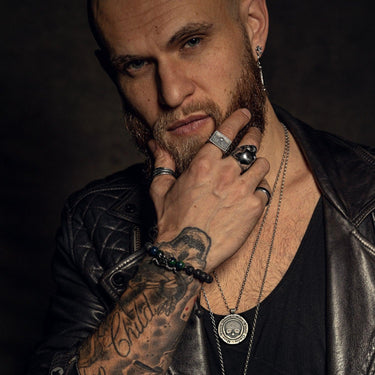 Ben Poole wearing Black Feather Design Gothic Jewellery